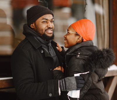 people-walks-outside-winter-day-african-couple-people-with-medical-mask-min